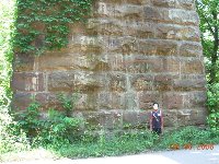 8 year old standing at column that's just 2 feet off of the road (no shoulder on road)