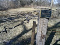 creepy slave cemetary. notice they used the old school slave shackels as a gate.