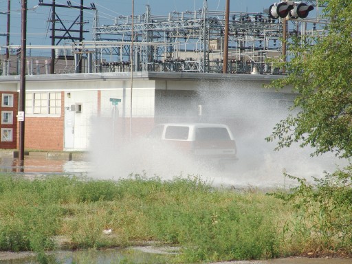 Truck slamming into water