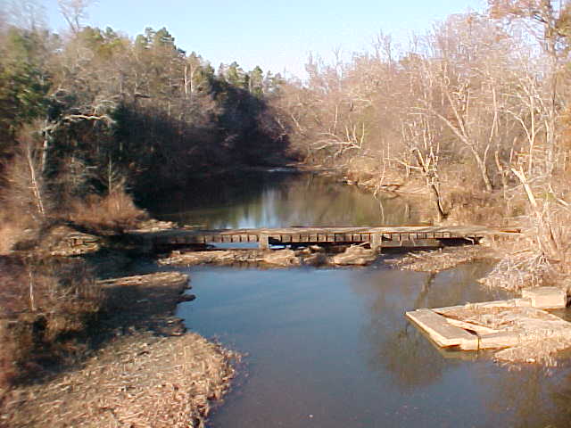 View of low water bridge from new bridge, note collapsed pier in foreground