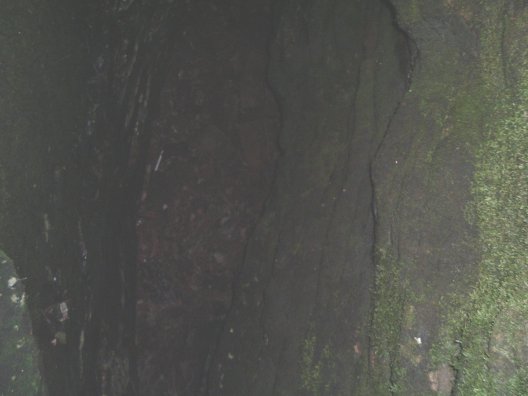 Looking down into the cave